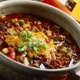 Chile con carne is one of the defining dishes of TexMex cuisine.